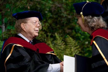 Dr. John-Roger congratulates DSS Grad Wendy Kunkel